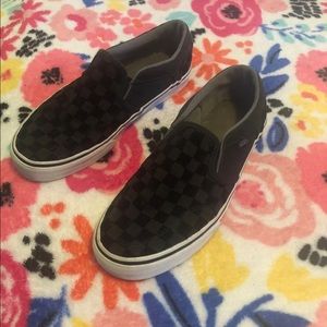 Black and grey checkered vans